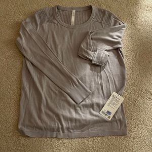 Light weight lululemon sweater with open back